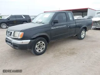 1998 Nissan Frontier 2WD XE with VIN 1N6DD26S2WC325599, listed as a IAAI auction lot 41551614 with 99,047 mi miles. Bid and sale history available at carsss.com. Image 2.