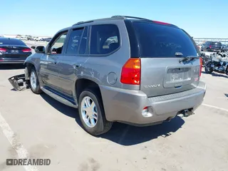 2008 GMC Envoy Denali with VIN 1GKET63M082201867, listed as a IAAI auction lot 41874803 with 218,639 mi miles. Bid and sale history available at carsss.com. Image 3.