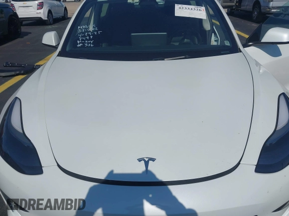 2023 Tesla Model 3 with VIN 5YJ3E1EA0PF548498, listed as a IAAI auction lot 42334326 with 17,674 mi miles and . Bid and sale history available at DreamBid. Image 10.
