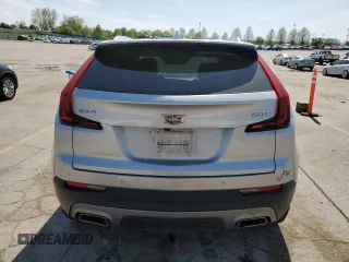 2019 Cadillac XT4 FWD Premium Luxury z VIN 1GYFZCR4XKF224734, wystawiony jako Copart lot #54141975 z przebiegiem 87 633 mil mil oraz Szkody całkowita. Historia ofert i sprzedaży dostępna na DreamBid. Obrazek 6.
