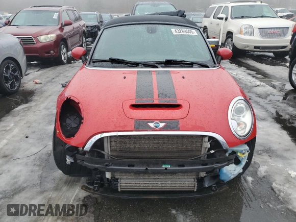 2015 MINI Roadster S z VIN WMWSY3C58FT567023, wystawiony jako Copart lot #43289505 z przebiegiem 115 029 mil mil oraz Szkoda całkowita • Salvage title. Historia ofert i sprzedaży dostępna na DreamBid. Obrazek 5.