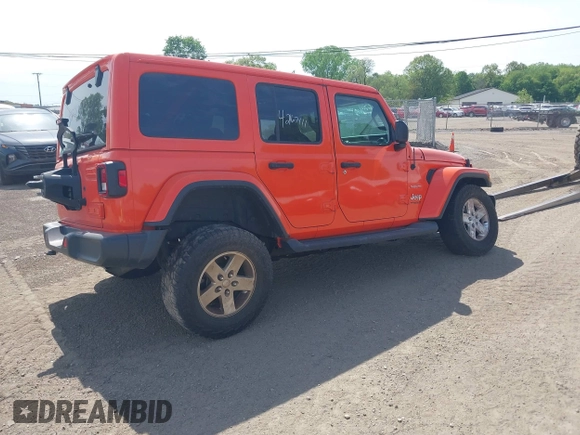 2019 Jeep Wrangler Unlimited Sahara with VIN 1C4HJXEGXKW579982, listed as a IAAI auction lot 42167111 with 98,243 mi miles and . Bid and sale history available at DreamBid. Image 4.