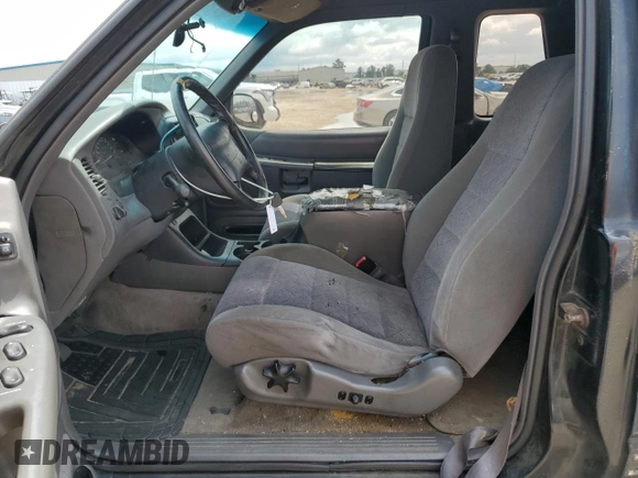 1999 Ford Explorer Sport z VIN 1FMYU22X9XUC03819, wystawiony jako Copart lot #69840564 z przebiegiem 214 315 mil mil oraz Szkoda całkowita • Salvage title. Historia ofert i sprzedaży dostępna na DreamBid. Obrazek 7.