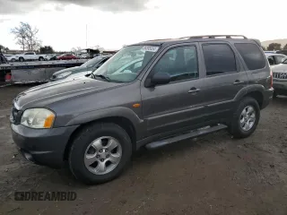 2003 Mazda Tribute LX with VIN 4F2YZ04133KM26091, listed as a Copart auction lot 86595334 with 194,280 mi miles and Salvage Title. Bid and sale history available at DreamBid. Image 1.