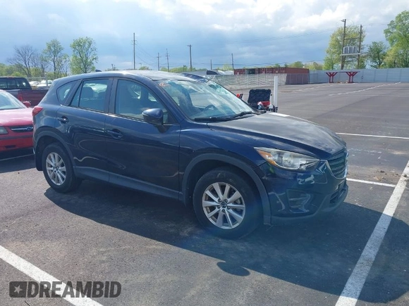 2016 Mazda CX-5 Sport with VIN JM3KE2BY3G0740488, listed as a IAAI auction lot 42000449 with 43,009 mi miles. Bid and sale history available at carsss.com. Image 1.