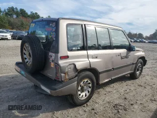 1995 Suzuki Sidekick JX z VIN 2S3TD03V2S6408939, wystawiony jako Copart lot #78862794 z przebiegiem 88 216 mil mil oraz Tytuł czysty. Historia ofert i sprzedaży dostępna na DreamBid. Obrazek 3.