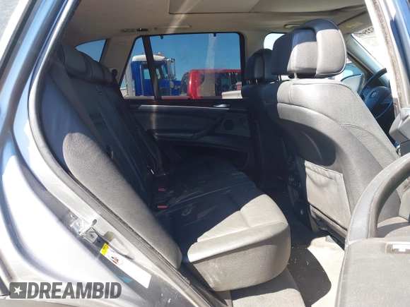 2008 BMW X5 3.0si with VIN 5UXFE43598L022453, listed as a IAAI auction lot 41852297 with 185,528 mi miles. Bid and sale history available at carsss.com. Image 8.