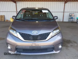 2015 Toyota Sienna SE with VIN 5TDXK3DC1FS667924, listed as a IAAI auction lot 42062805 with 123,504 mi miles. Bid and sale history available at carsss.com. Image 12.