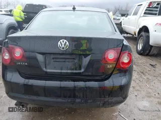 2009 Volkswagen Jetta Sedan SE with VIN 3VWRM71K39M061922, listed as a IAAI auction lot 41833902 with 207,905 mi miles. Bid and sale history available at carsss.com. Image 16.