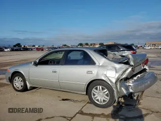 2001 Toyota Camry CE z VIN 4T1BG22K01U085409, wystawiony jako Copart lot #55941765 z przebiegiem 215 062 mil mil oraz Szkoda całkowita • Salvage title. Historia ofert i sprzedaży dostępna na DreamBid. Obrazek 2.