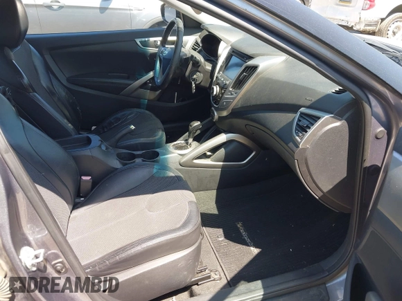 2012 Hyundai Veloster w/Black Int with VIN KMHTC6AD5CU030788, listed as a IAAI auction lot 42774337 with 104,297 mi miles and . Bid and sale history available at DreamBid. Image 5.
