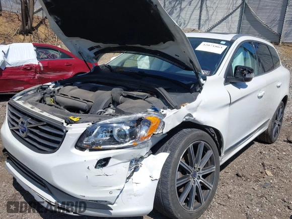 2014 Volvo XC60 R-Design Premier Plus with VIN YV4902DZ8E2545061, listed as a IAAI auction lot 42071863 with 90,718 mi miles and . Bid and sale history available at DreamBid. Image 6.