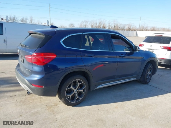 2019 BMW X1 sDrive28i with VIN WBXHU7C54K5L11298, listed as a IAAI auction lot 41662155 with 36,753 mi miles. Bid and sale history available at carsss.com. Image 4.