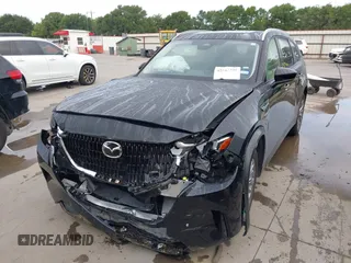 2025 Mazda CX-90 Preferred with VIN JM3KKBHD7S1208001, listed as a IAAI auction lot 42503425 with 16,745 mi miles and . Bid and sale history available at DreamBid. Image 2.
