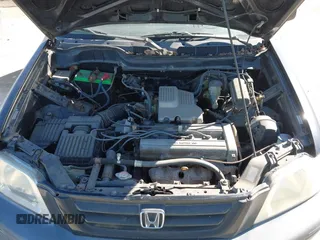 1999 Honda CR-V LX with VIN JHLRD184XXC046133, listed as a IAAI auction lot 41696784 with 236,532 mi miles. Bid and sale history available at carsss.com. Image 10.