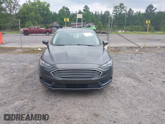 2017 Ford Fusion SE z VIN 3FA6P0HD6HR174945, wystawiony jako IAAI lot #42416548 z przebiegiem 128 410 mil mil oraz . Historia ofert i sprzedaży dostępna na DreamBid. Obrazek 12.