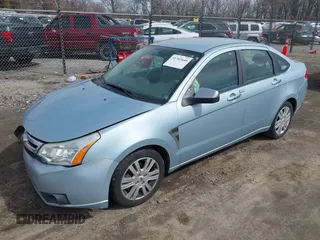 2009 Ford Focus SEL with VIN 1FAHP37N59W164619, listed as a IAAI auction lot 41762640 with 147,643 mi miles. Bid and sale history available at carsss.com. Image 2.