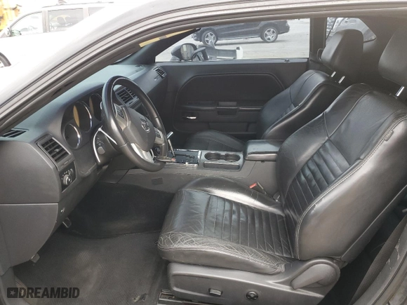 2013 Dodge Challenger R/T with VIN 2C3CDYBT9DH558815, listed as a Copart auction lot 47601315 with 124,098 mi miles and Salvage Title. Bid and sale history available at carsss.com. Image 7.