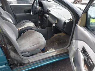 1995 Saturn SL with VIN 1G8ZK5271SZ147168, listed as a IAAI auction lot 42480978 with 159,136 mi miles and . Bid and sale history available at DreamBid. Image 5.