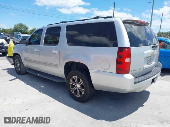2012 Chevrolet Suburban LT with VIN 1GNSCJE04CR230288, listed as a IAAI auction lot 42049580 with 166,596 mi miles. Bid and sale history available at carsss.com. Image 3.