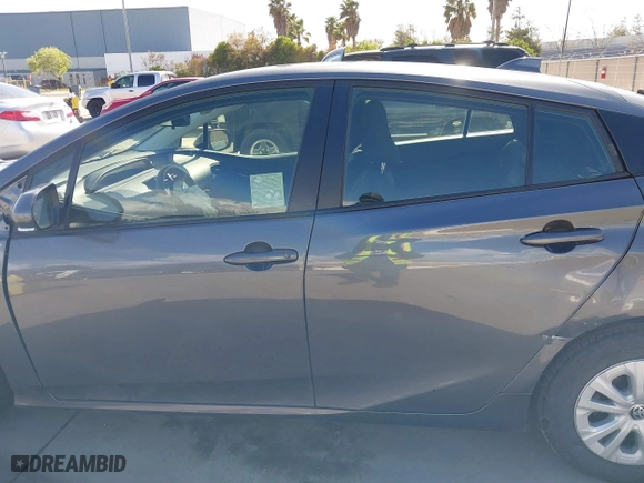 2022 Toyota Prius L Eco with VIN JTDKAMFU4N3177258, listed as a IAAI auction lot 39148811 with 50,902 mi miles. Bid and sale history available at carsss.com. Image 14.