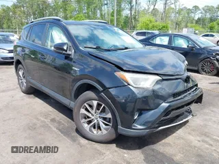 2016 Toyota RAV4 Hybrid XLE with VIN JTMRJREV4GD030361, listed as a IAAI auction lot 42008893 with 85,783 mi miles. Bid and sale history available at carsss.com. Image 1.