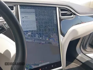2014 Tesla Model S 60 with VIN 5YJSA1H12EFP39582, listed as a IAAI auction lot 42545143 with 117,383 mi miles and . Bid and sale history available at DreamBid. Image 17.