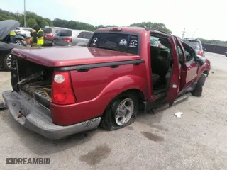 2004 Ford Explorer Sport Trac XLS with VIN 1FMZU67K94UB15891, listed as a IAAI auction lot 36842958 with 1 mi miles. Bid and sale history available at carsss.com. Image 4.
