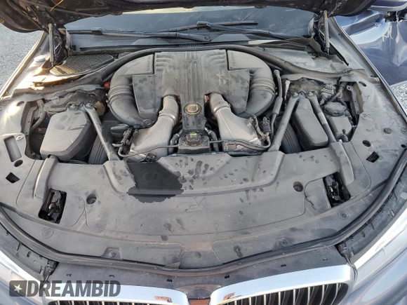 2017 BMW 7 Series with VIN WBA7F2C35HG855999, listed as a Copart auction lot 38122564 with 85,926 mi miles and . Bid and sale history available at DreamBid. Image 11.