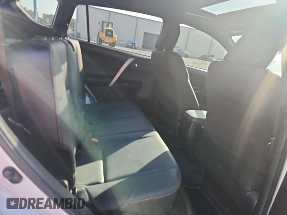 2016 Toyota RAV4 SE z VIN JTMNFREVXGD080908, wystawiony jako Copart lot #60791155 z przebiegiem 87 368 mil mil oraz Szkoda całkowita • Salvage title. Historia ofert i sprzedaży dostępna na DreamBid. Obrazek 11.