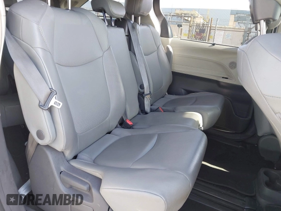 2021 Toyota Sienna XLE z VIN 5TDJRKEC7MS009306, wystawiony jako IAAI lot #42328482 z przebiegiem 169 443 mil mil oraz . Historia ofert i sprzedaży dostępna na DreamBid. Obrazek 8.