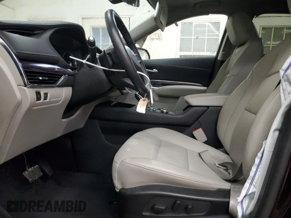 2022 Cadillac XT4 AWD Luxury with VIN 1GYFZBR45NF145986, listed as a Copart auction lot 79198274 with 23,477 mi miles and Salvage Title. Bid and sale history available at carsss.com. Image 7.