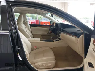 2014 Lexus ES 300h with VIN JTHBW1GG9E2043696, listed as a IAAI auction lot 42392424 with 74,370 mi miles and . Bid and sale history available at DreamBid. Image 5.