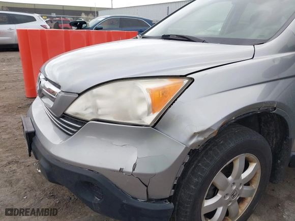 2007 Honda CR-V EX with VIN JHLRE48547C098607, listed as a IAAI auction lot 42047297 with 185,145 mi miles. Bid and sale history available at carsss.com. Image 6.