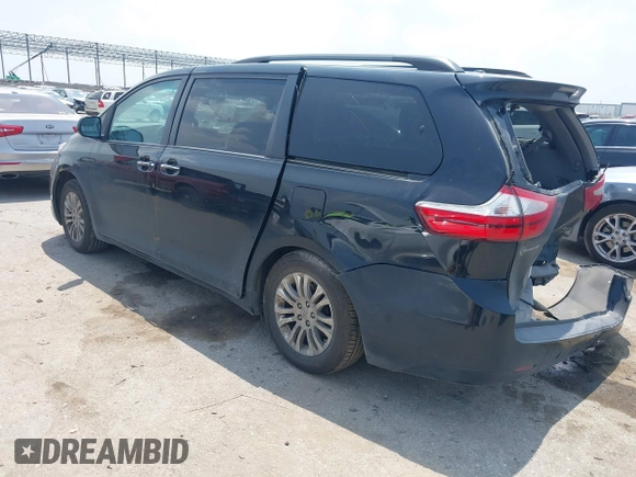 2016 Toyota Sienna XLE z VIN 5TDYK3DC5GS703586, wystawiony jako IAAI lot #42323587 z przebiegiem 127 640 mil mil oraz . Historia ofert i sprzedaży dostępna na DreamBid. Obrazek 3.