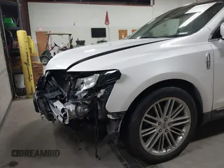 2013 Lincoln MKT EcoBoost with VIN 2LMHJ5AT3DBL56954, listed as a IAAI auction lot 41705877 with 148,771 mi miles. Bid and sale history available at carsss.com. Image 6.