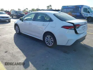 2024 Toyota Corolla Hybrid LE with VIN JTDBCMFE2RJ031865, listed as a IAAI auction lot 41602715 with 10,892 mi miles. Bid and sale history available at carsss.com. Image 3.