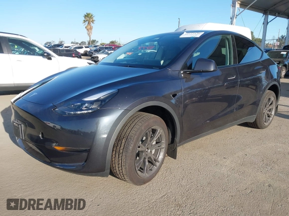 2024 Tesla Model Y with VIN 7SAYGDED5RF103983, listed as a IAAI auction lot 41933836 with 11,398 mi miles and . Bid and sale history available at DreamBid. Image 17.