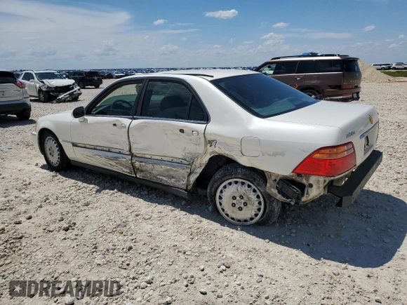 1999 Acura RL with VIN JH4KA9664XC004727, listed as a Copart auction lot 62120054 with 0 mi miles and Salvage Title. Bid and sale history available at carsss.com. Image 2.