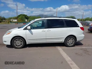 2010 Toyota Sienna XLE with VIN 5TDYK4CC7AS291119, listed as a IAAI auction lot 41742917 with 201,590 mi miles. Bid and sale history available at carsss.com. Image 14.