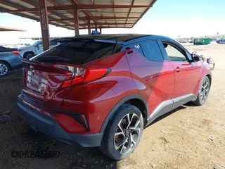 2019 Toyota C-HR XLE with VIN JTNKHMBX8K1032206, listed as a IAAI auction lot 41852134 with 136,107 mi miles. Bid and sale history available at carsss.com. Image 4.