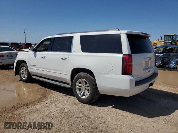 2015 Chevrolet Suburban LS with VIN 1GNSCHEC2FR295695, listed as a Copart auction lot 52395345 with 118,664 mi miles and Salvage title. Bid and sale history available at DreamBid. Image 2.