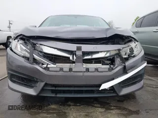 2017 Honda Civic LX z VIN 19XFC2F53HE023730, wystawiony jako IAAI lot #41885003 z przebiegiem 129 595 mil mil oraz . Historia ofert i sprzedaży dostępna na DreamBid. Obrazek 12.