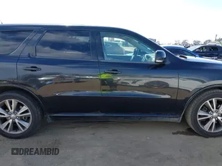 2013 Dodge Durango R/T with VIN 1C4SDHCT2DC530301, listed as a IAAI auction lot 42008853 with 186,148 mi miles and . Bid and sale history available at DreamBid. Image 13.