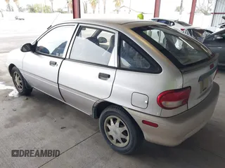 1997 Ford Aspire z VIN KNJLT06H0V6215753, wystawiony jako IAAI lot #41504661 z przebiegiem 80 300 mil mil oraz . Historia ofert i sprzedaży dostępna na DreamBid. Obrazek 3.