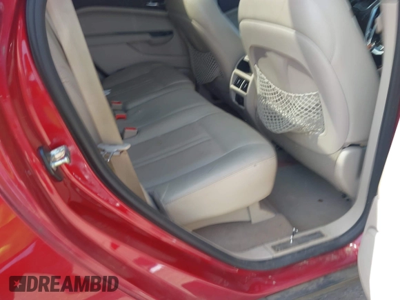 2016 Cadillac SRX Luxury Collection with VIN 3GYFNBE34GS513694, listed as a IAAI auction lot 42033412 with 106,215 mi miles and . Bid and sale history available at DreamBid. Image 8.