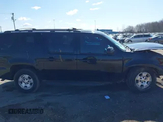 2011 Chevrolet Suburban LT with VIN 1GNSKJE30BR201074, listed as a IAAI auction lot 41986073 with 182,611 mi miles. Bid and sale history available at carsss.com. Image 13.