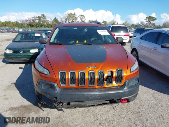 2014 Jeep Cherokee Trailhawk with VIN 1C4PJMBS4EW254879, listed as a IAAI auction lot 41550356 with 101,077 mi miles. Bid and sale history available at carsss.com. Image 13.