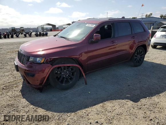 2020 Jeep Grand Cherokee Laredo E with VIN 1C4RJEAG2LC379633, listed as a Copart auction lot 58437555 with 57,219 mi miles and Salvage title. Bid and sale history available at DreamBid. Image 1.