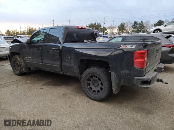 2017 Chevrolet Silverado 1500 LT with VIN 1GCVKREC1HZ225218, listed as a Copart auction lot 48948735 with 114,627 mi miles and Salvage Title. Bid and sale history available at DreamBid. Image 2.
